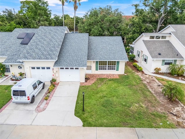 1467 Disston Ave, Clermont, FL 34711 - view of front facade featuring a shingled roof, driveway, a front lawn, and stucco siding