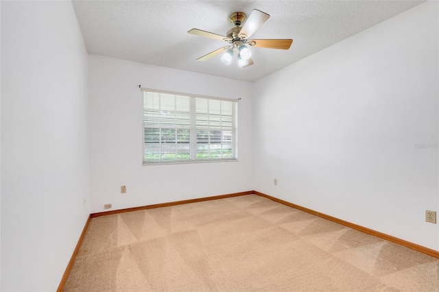 1467 Disston Ave, Clermont, FL 34711 - unfurnished room with light colored carpet, a ceiling fan, and a textured ceiling