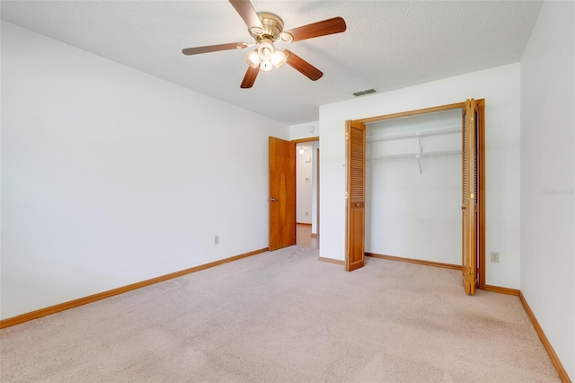 1467 Disston Ave, Clermont, FL 34711 - unfurnished bedroom with carpet floors, a closet, and a ceiling fan