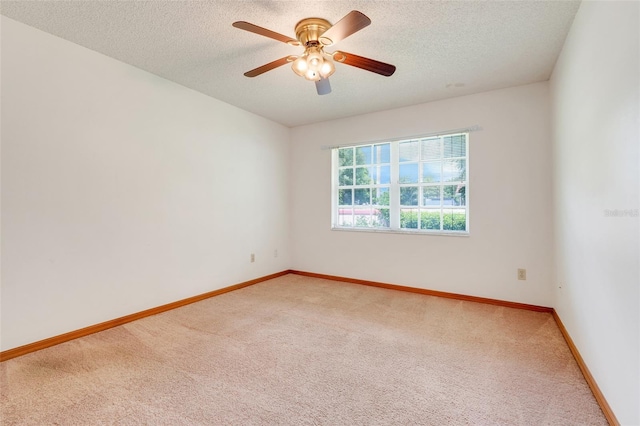 1467 Disston Ave, Clermont, FL 34711 - empty room featuring light carpet, a textured ceiling, and ceiling fan