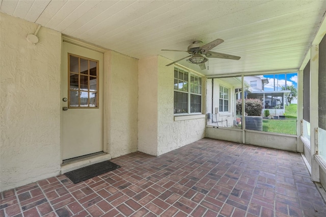 1467 Disston Ave, Clermont, FL 34711 - unfurnished sunroom with a ceiling fan