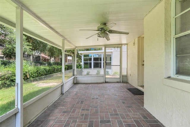 1467 Disston Ave, Clermont, FL 34711 - unfurnished sunroom with a ceiling fan and plenty of natural light