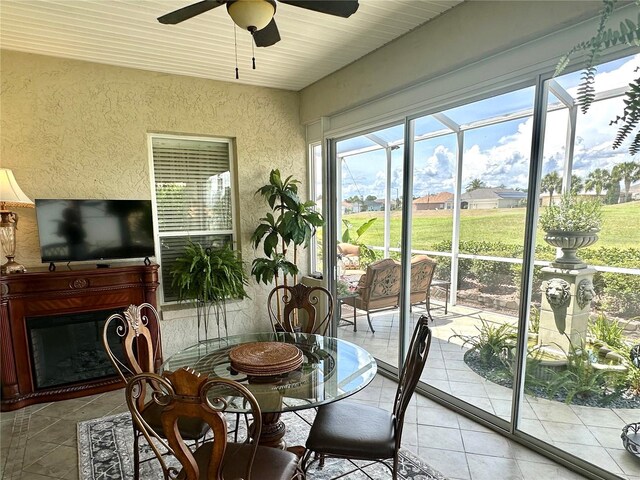 12183 SE 178th St, Summerfield, FL 34491 - sunroom / solarium featuring a ceiling fan