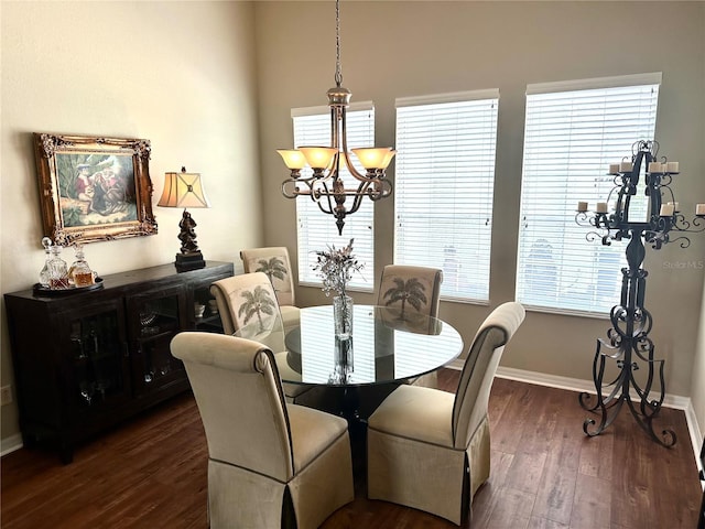 12183 SE 178th St, Summerfield, FL 34491 - dining space with a chandelier and dark wood finished floors