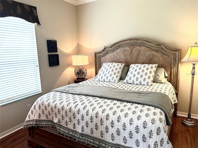 12183 SE 178th St, Summerfield, FL 34491 - bedroom featuring multiple windows, wood finished floors, and crown molding