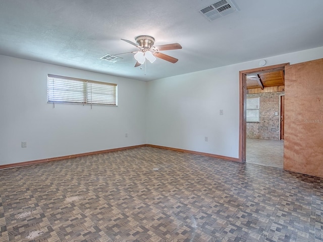 6731 Lake Griffin Rd, Lady Lake, FL 32159 - empty room featuring a ceiling fan and baseboards