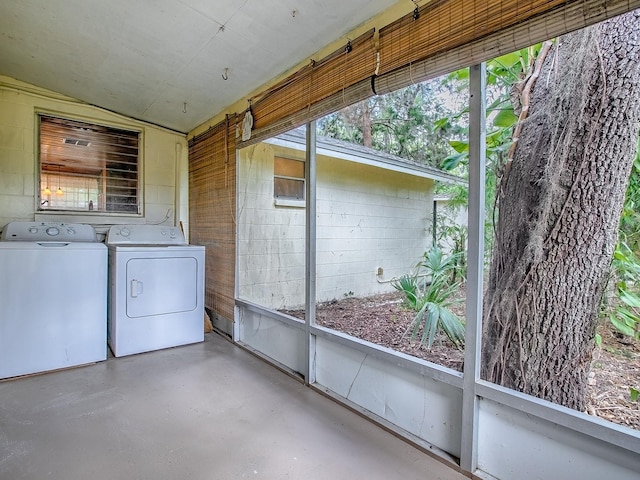 6731 Lake Griffin Rd, Lady Lake, FL 32159 - unfurnished sunroom with washing machine and clothes dryer
