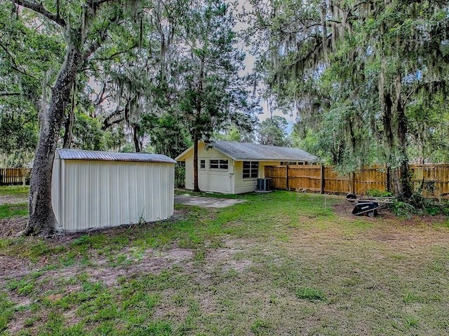 6731 Lake Griffin Rd, Lady Lake, FL 32159 - fenced backyard with a storage shed