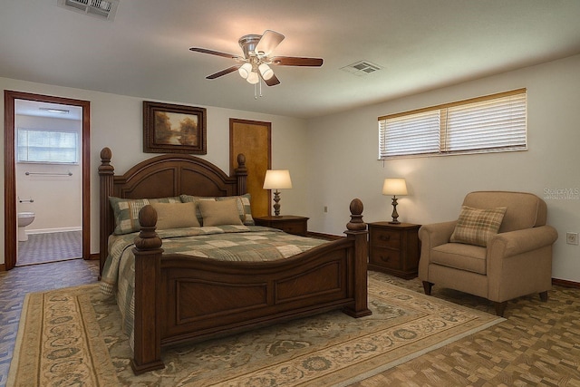 6731 Lake Griffin Rd, Lady Lake, FL 32159 - bedroom with ensuite bathroom and ceiling fan