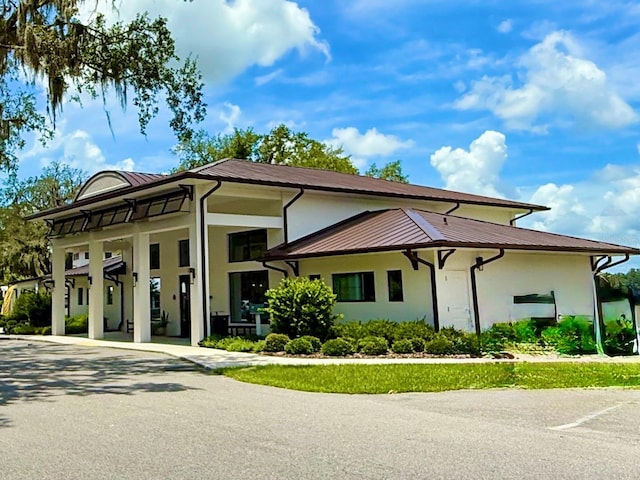 3607 Umbrella Tree Ln, Oxford, FL 34484 - view of front of house with stucco siding
