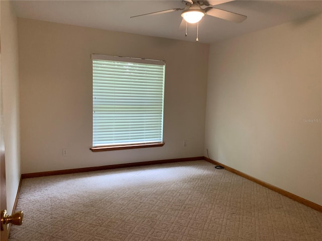2530 Shady Ln, Groveland, FL 34736 - empty room featuring carpet flooring and a ceiling fan