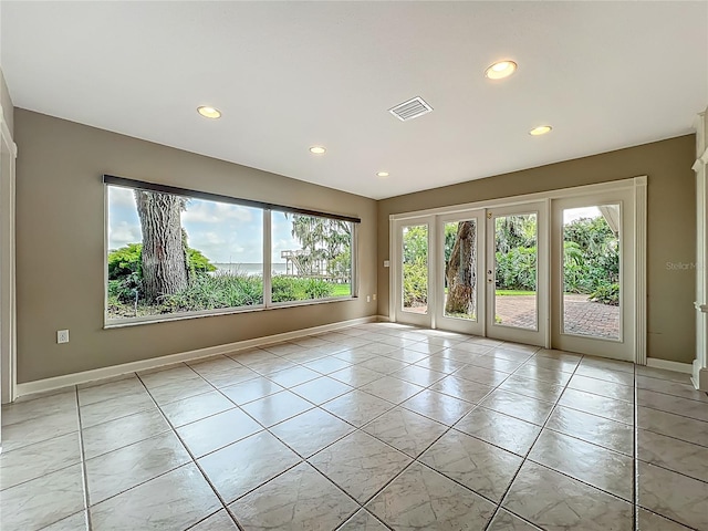 504 Banning Beach Rd, Tavares, FL 32778 - empty room featuring recessed lighting and light tile patterned flooring