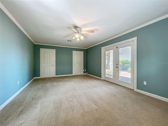 504 Banning Beach Rd, Tavares, FL 32778 - carpeted empty room with crown molding, french doors, and ceiling fan
