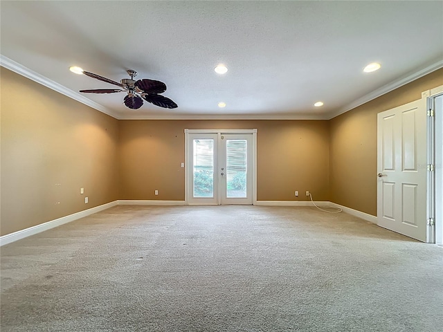 504 Banning Beach Rd, Tavares, FL 32778 - unfurnished room with ornamental molding, recessed lighting, ceiling fan, french doors, and light colored carpet