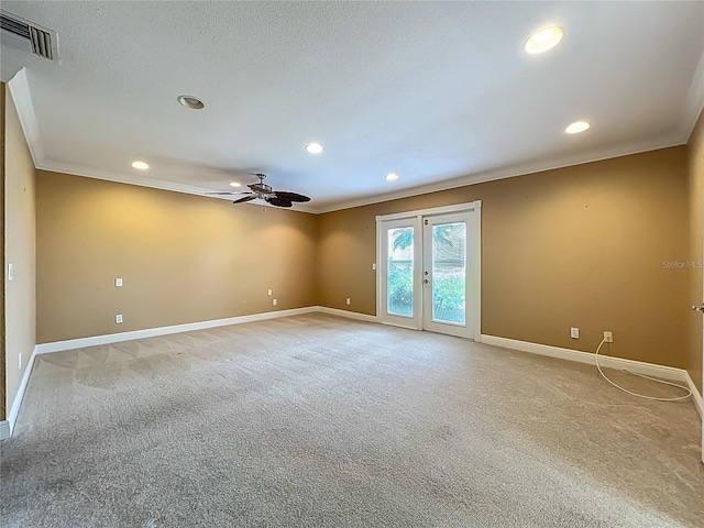 504 Banning Beach Rd, Tavares, FL 32778 - unfurnished room featuring ornamental molding, ceiling fan, light carpet, recessed lighting, and french doors