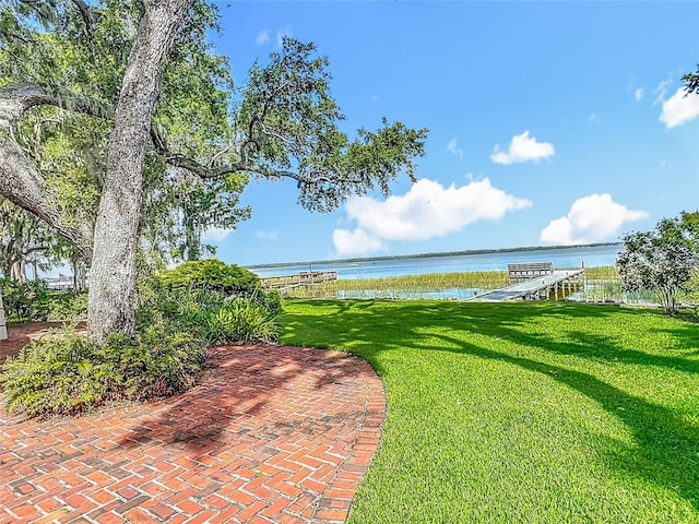 504 Banning Beach Rd, Tavares, FL 32778 - view of green lawn with a water view