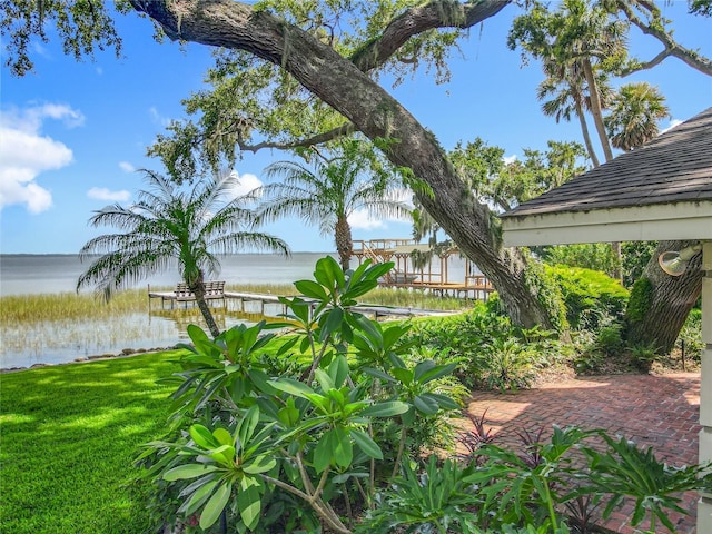 504 Banning Beach Rd, Tavares, FL 32778 - view of green lawn with a water view