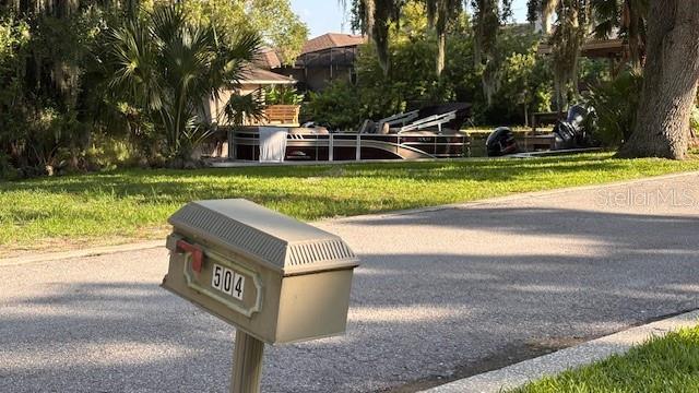 504 Banning Beach Rd, Tavares, FL 32778 - view of home's community with a lawn