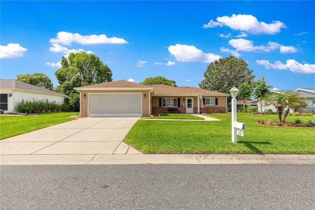 9790 SE 175th St, Summerfield, FL 34491 - ranch-style house with a garage, concrete driveway, and a front yard