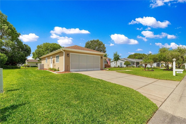 9790 SE 175th St, Summerfield, FL 34491 - view of front facade featuring a garage and a front yard