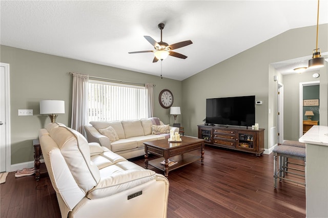 9790 SE 175th St, Summerfield, FL 34491 - living room with ceiling fan, vaulted ceiling, and dark wood-style flooring