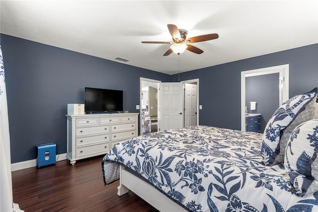 9790 SE 175th St, Summerfield, FL 34491 - bedroom with dark wood-style flooring, connected bathroom, and ceiling fan