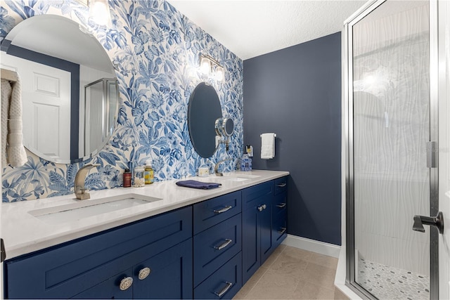 9790 SE 175th St, Summerfield, FL 34491 - bathroom featuring wallpapered walls, double vanity, a stall shower, and an accent wall