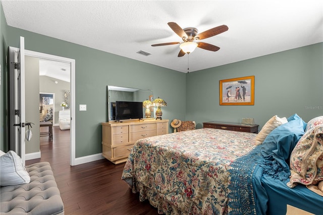 9790 SE 175th St, Summerfield, FL 34491 - bedroom with dark wood finished floors and ceiling fan