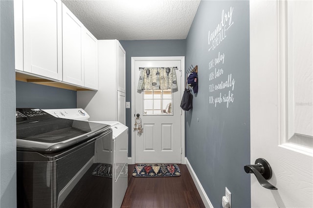 9790 SE 175th St, Summerfield, FL 34491 - laundry room with washer and dryer, cabinet space, dark wood-style floors, and a textured ceiling