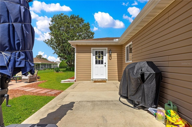 9790 SE 175th St, Summerfield, FL 34491 - entrance to property featuring a patio area and a yard