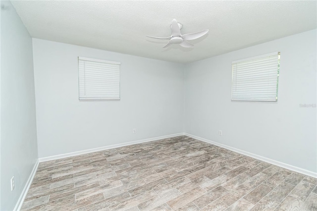 25 Jule Rd, Macclenny, FL 32063 - spare room featuring wood finished floors, ceiling fan, and a textured ceiling