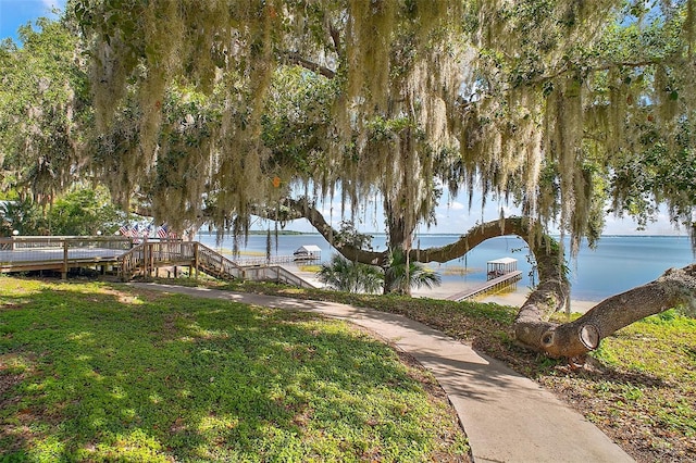 13033 SE 158th Ln, Weirsdale, FL 32195 - view of green lawn featuring a water view