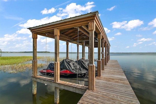 13033 SE 158th Ln, Weirsdale, FL 32195 - dock featuring a water view and boat lift