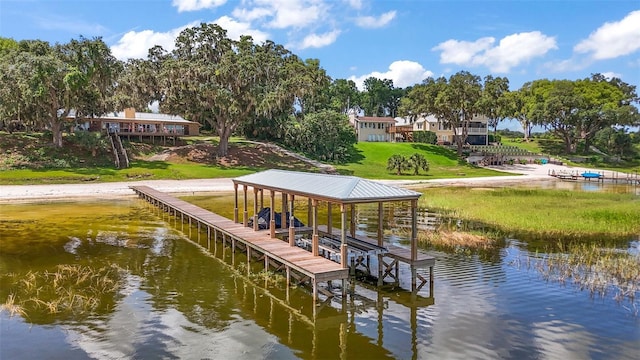 13033 SE 158th Ln, Weirsdale, FL 32195 - dock featuring a water view, a yard, and boat lift
