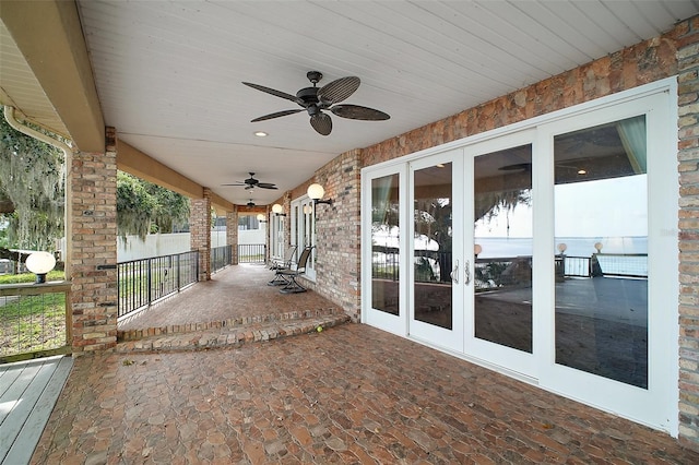 13033 SE 158th Ln, Weirsdale, FL 32195 - view of patio / terrace featuring french doors and ceiling fan