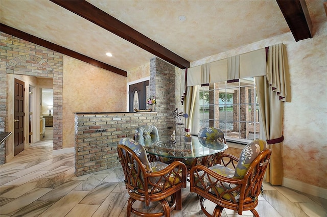13033 SE 158th Ln, Weirsdale, FL 32195 - dining area with beamed ceiling and baseboards