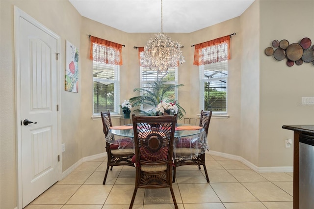 4018 Chandler Estates Dr, Apopka, FL 32712 - dining space featuring a chandelier and light tile patterned floors