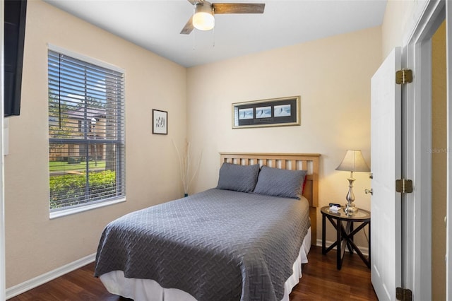 624 Terra Lago St, Davenport, FL 33897 - bedroom with multiple windows, wood finished floors, and a ceiling fan