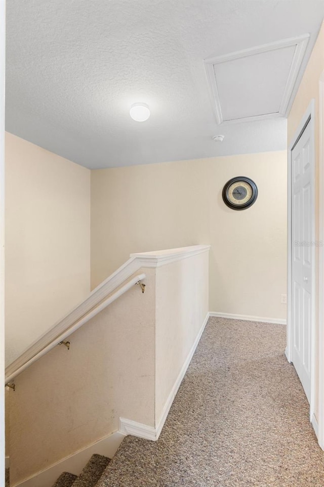 624 Terra Lago St, Davenport, FL 33897 - corridor with carpet and a textured ceiling