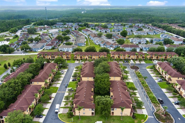 624 Terra Lago St, Davenport, FL 33897 - aerial perspective of suburban area featuring a forest