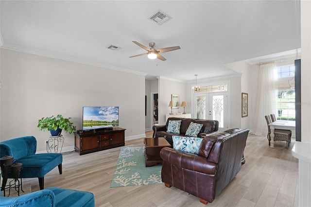 6136 Lake Emma Rd, Groveland, FL 34736 - living area with light wood finished floors, ceiling fan, french doors, and ornamental molding
