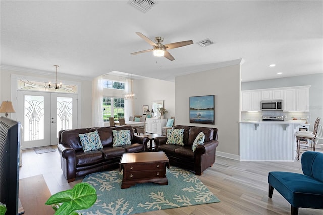 6136 Lake Emma Rd, Groveland, FL 34736 - living room featuring a chandelier, light wood-style floors, ornamental molding, a ceiling fan, and recessed lighting