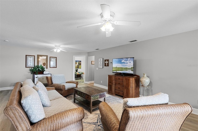 6136 Lake Emma Rd, Groveland, FL 34736 - living room featuring ceiling fan and light wood-style flooring