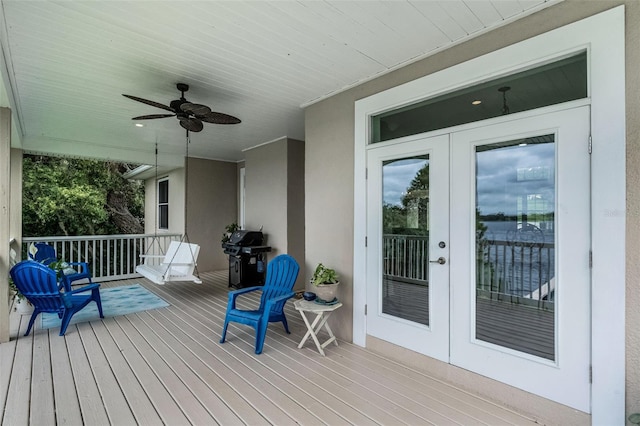 6136 Lake Emma Rd, Groveland, FL 34736 - deck featuring french doors, area for grilling, and ceiling fan