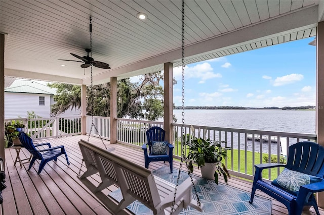 6136 Lake Emma Rd, Groveland, FL 34736 - wooden deck featuring a water view and ceiling fan