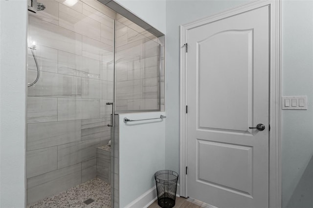 6136 Lake Emma Rd, Groveland, FL 34736 - bathroom with a shower stall and baseboards