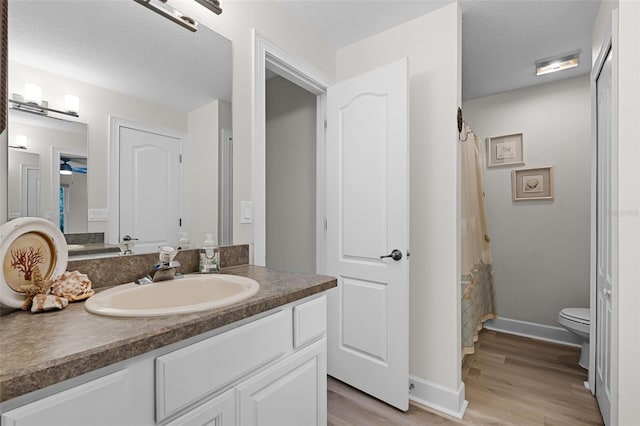 6136 Lake Emma Rd, Groveland, FL 34736 - full bath with vanity, wood finished floors, and a shower with curtain