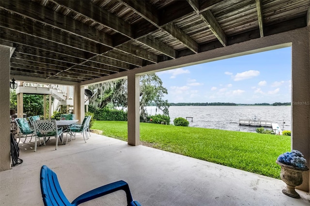 6136 Lake Emma Rd, Groveland, FL 34736 - view of patio / terrace with a water view, stairway, and outdoor dining area