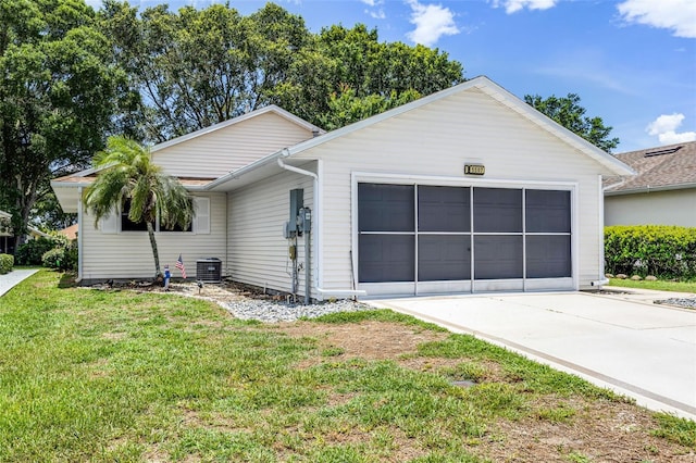 5507 Laver St, Leesburg, FL 34748 - view of front of property featuring a front lawn, a garage, and concrete driveway