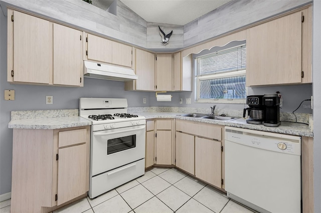 5507 Laver St, Leesburg, FL 34748 - kitchen featuring white appliances, premium range hood, light countertops, light brown cabinets, and light tile patterned flooring